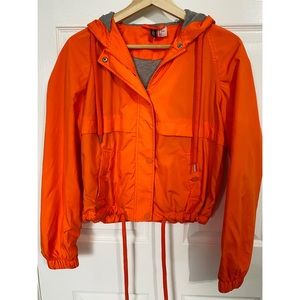 • orange wind breaker •